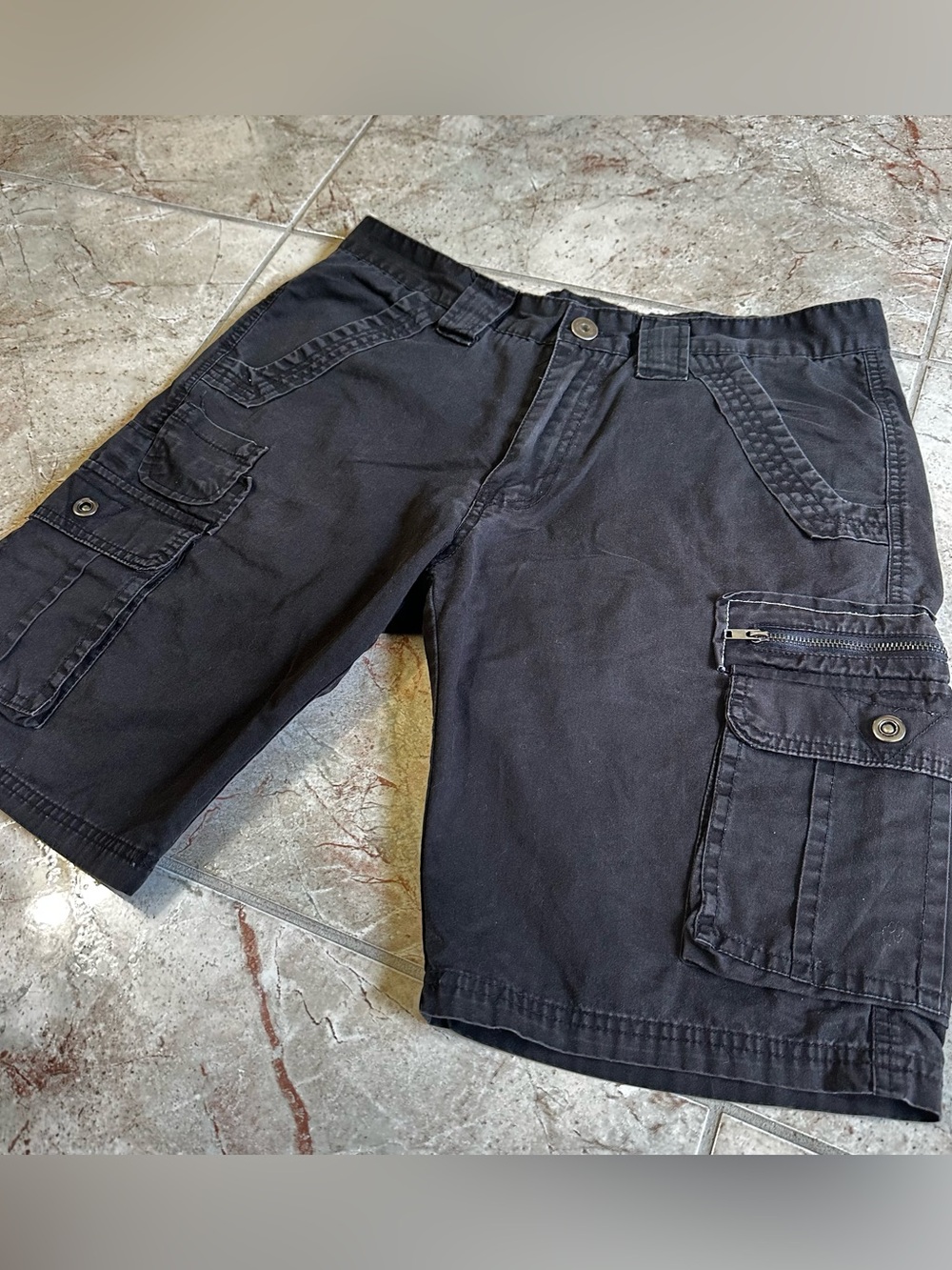 Black Smash cargo shorts with a clean Y2K utility vibe.